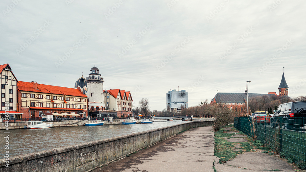 Fish Village, House of Soviets and the Cathedral on the banks of the river Pregolya