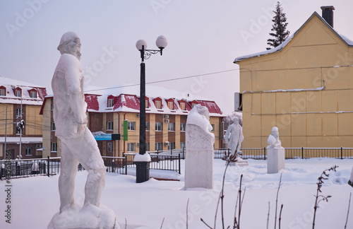 Soviet period sculpture square under the snow. Nizhny Tagil. Russia photo