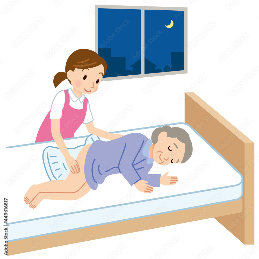 夜間のオムツ交換をするヘルパー 高齢者 介護 夜間のオムツ交換をするヘルパー 高齢者 介護
