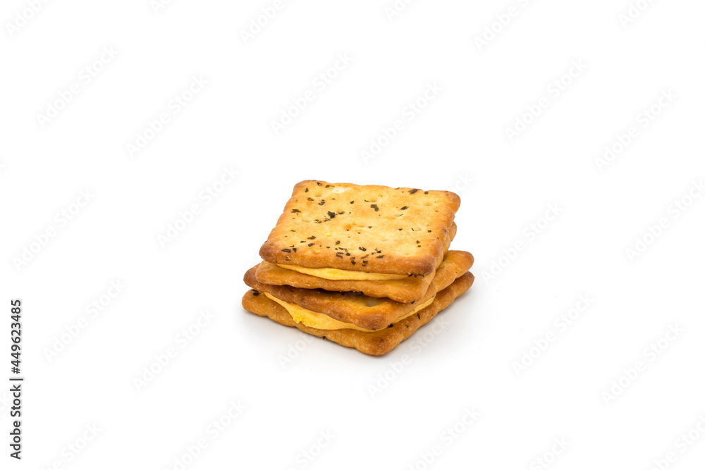 Cheese crackers with dried rosemary isolated on white background. Cheese crackers with dried rosemary isolated on white background.