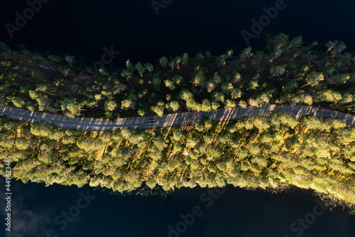 Top down view of the winding Punkaharju ridge road in Saimaa Region in Eastern Finland photo