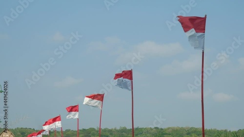 indonesian flag against blue sky