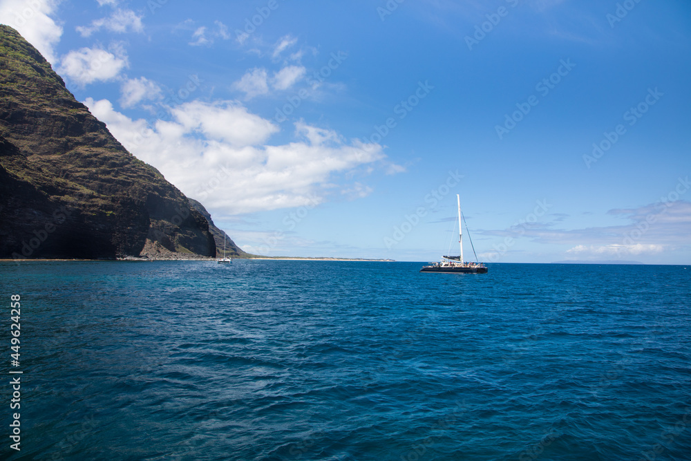 Yacht touring the Na Pali Coast