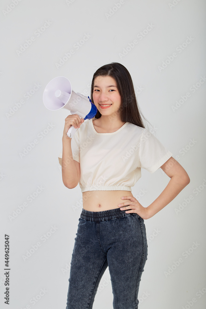 young pretty Asian woman holding megaphone young pretty Asian woman holding megaphone