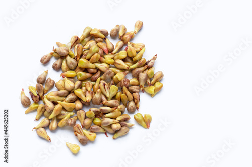 Grape seeds on white background.