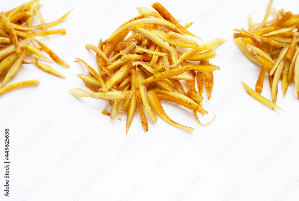 Sliced finger root on white background. Sliced finger root on white background.