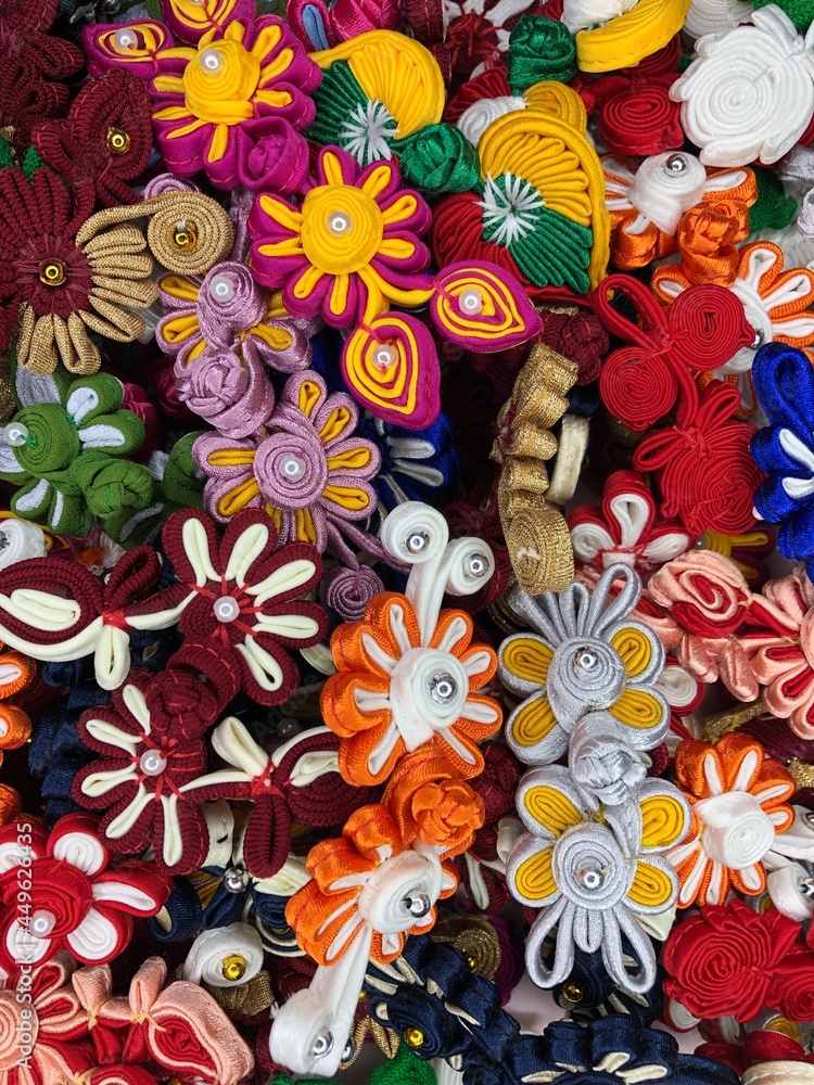 Naklejka premium DIY crafts for knitting fabric buttons at home asian cloth buttons hobbies to do at home