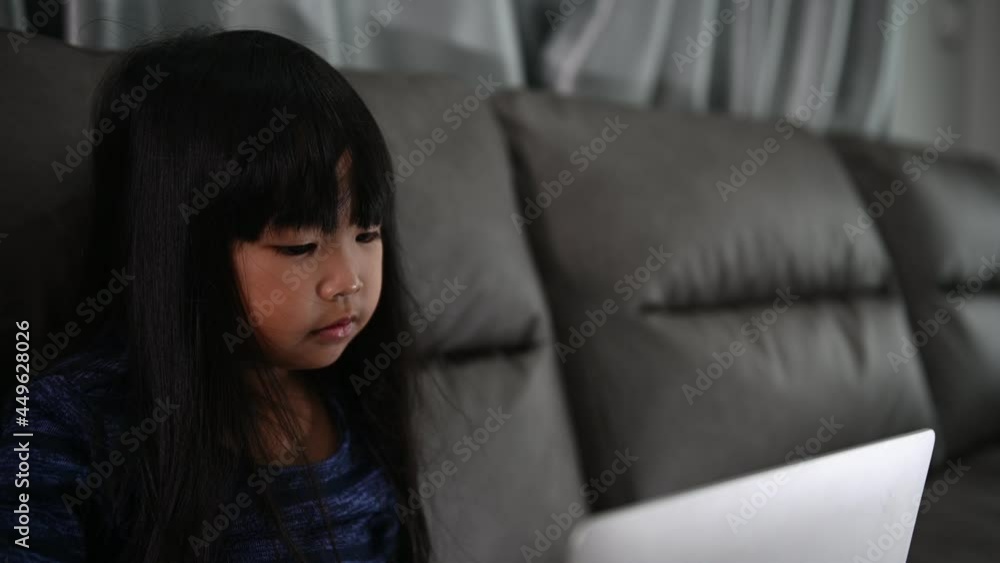 Asian little girl learn online at home,In the era of the Covid-19 epidemic, it is not possible to go to school normally. Asian little girl learn online at home,In the era of the Covid-19 epidemic, it is not possible to go to school normally.
