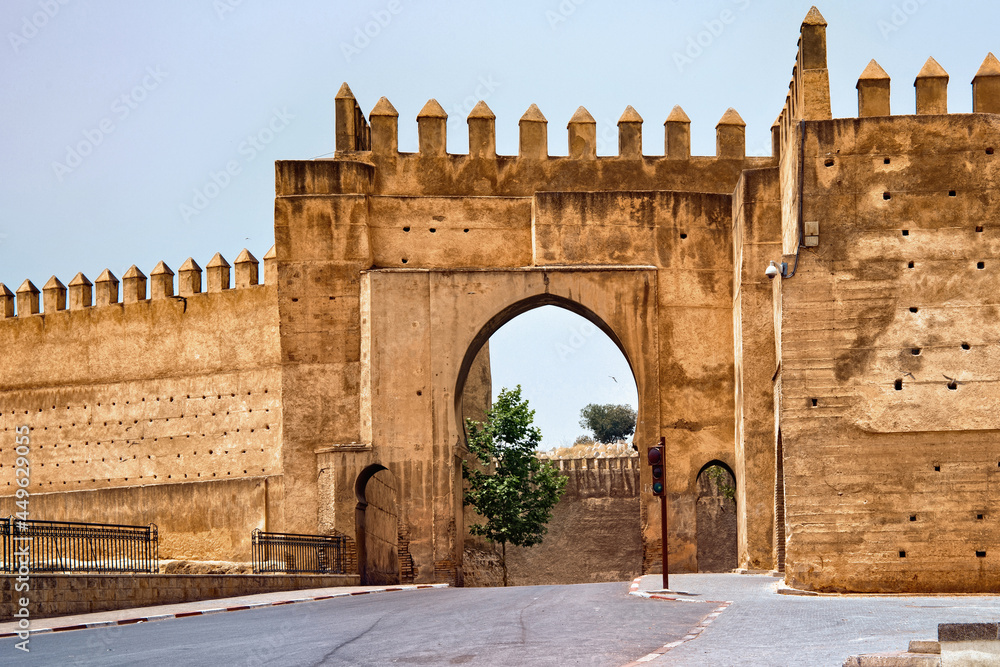 View of the old medieval gate in Fez on a sunny day. Near the Place Bou Jeloud square. Morocco.