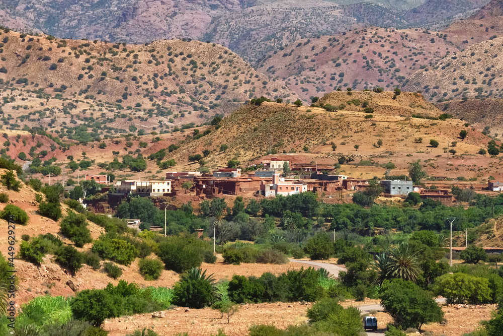 Village in the desert landscapes of mountainous Morocco on a sunny day.