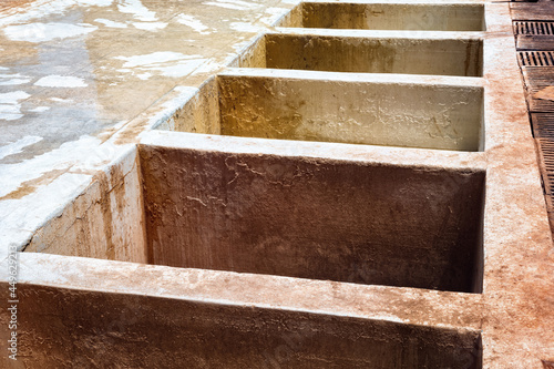 Old empty vats for dye in the Marrakesh tannery. Morocco.