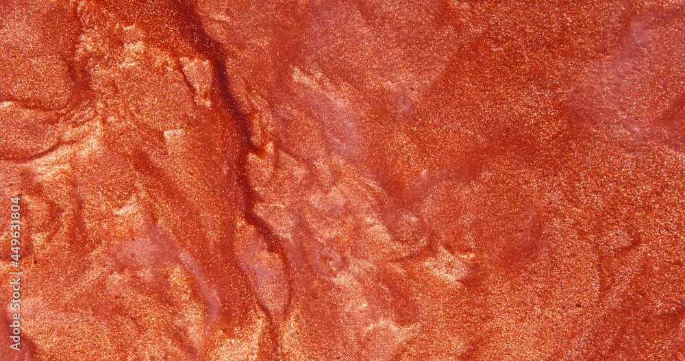 The Red glittering water slowly flows into beautiful abstract patterns The Red glittering water slowly flows into beautiful abstract patterns