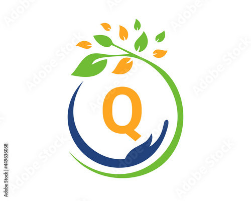 Charity logo with hand, leaf and Q letter concept. Hand care foundation logo