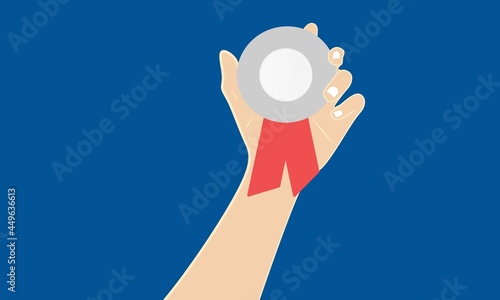 hands holding silver medal short men's blue background