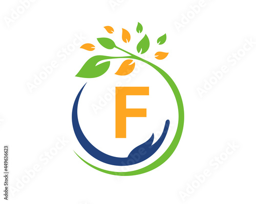 Charity logo with hand, leaf and F letter concept. Hand care foundation logo