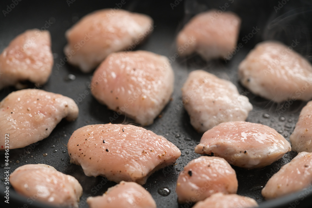 fying chicken fillet slices on nonstick pan fying chicken fillet slices on nonstick pan