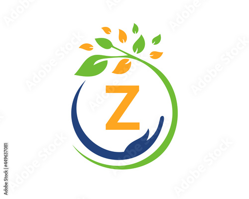 Charity logo with hand, leaf and Z letter concept. Hand care foundation logo