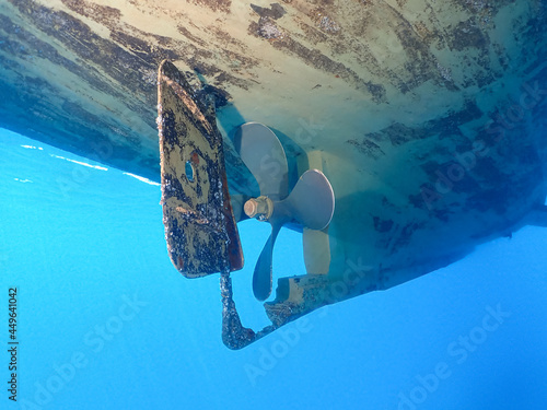 Boat propellers under the hull and Underwater.