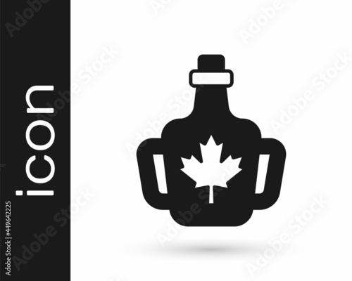 Black Bottle of maple syrup icon isolated on white background. Vector