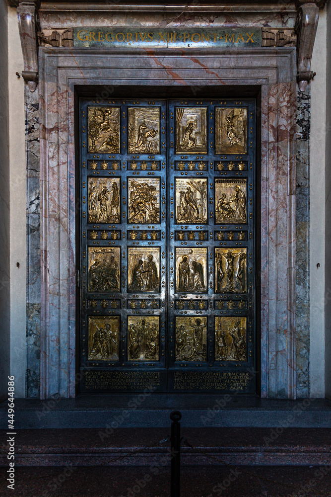 View to one of the doors of entrance in Saint Peter basilica, Vatican