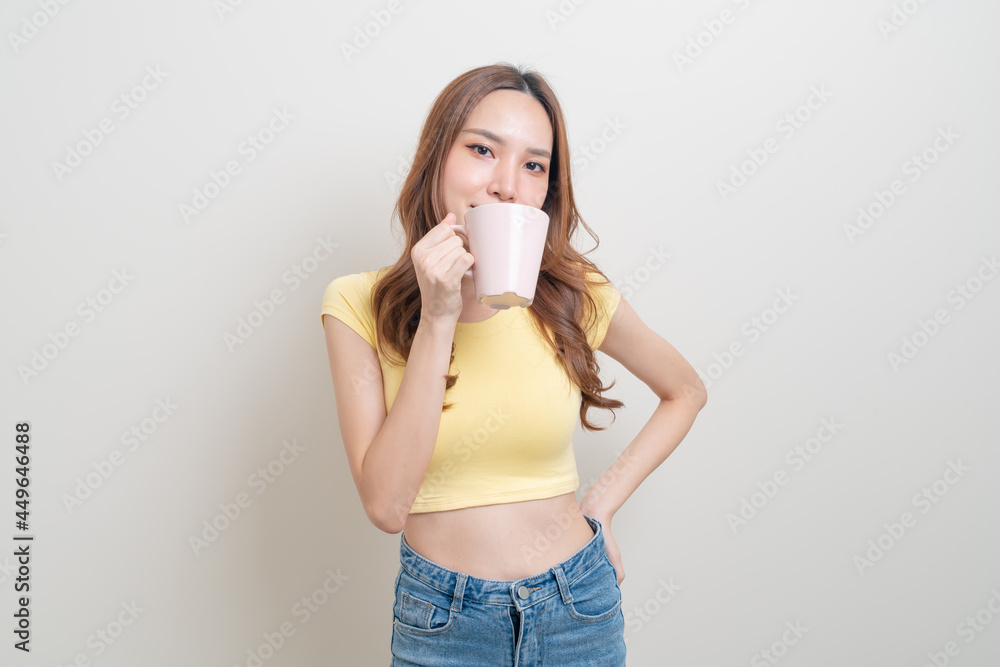 portrait beautiful Asian woman holding coffee cup or mug