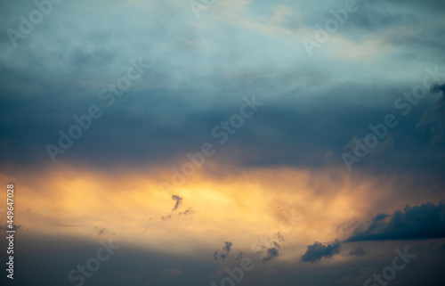 Dramatic sky with grey clouds over the city before the storm. Weather before or after a storm.