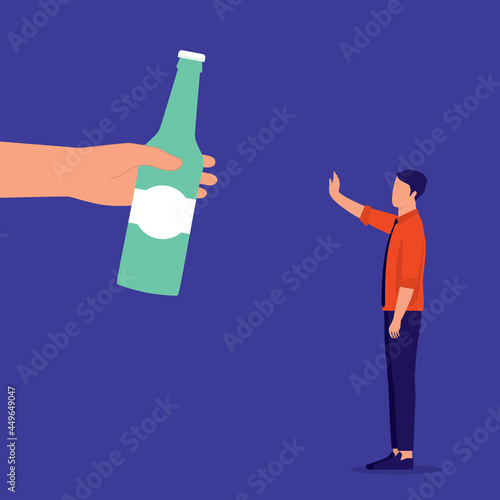 Young Man Saying No To Alcohol Drinks And Standing In A Stop Gesture.