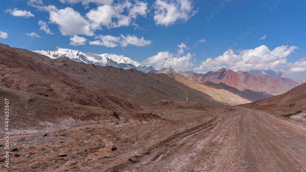 Colorful high altitude landscape of Pamir Highway at Kyzyl Art pass in Trans-Alai or Trans-Alay mountain range between Tajikistan and Kyrgyzstan borders