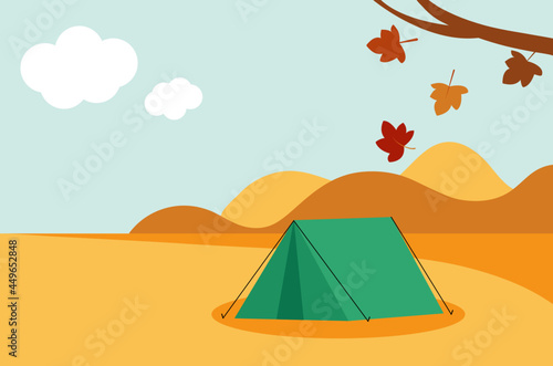 Green tent in the autumn nature