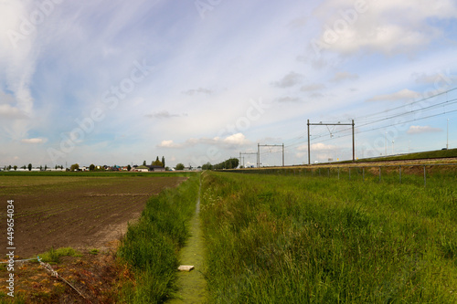 Railroad track along meadows in the Zuidplaspolder