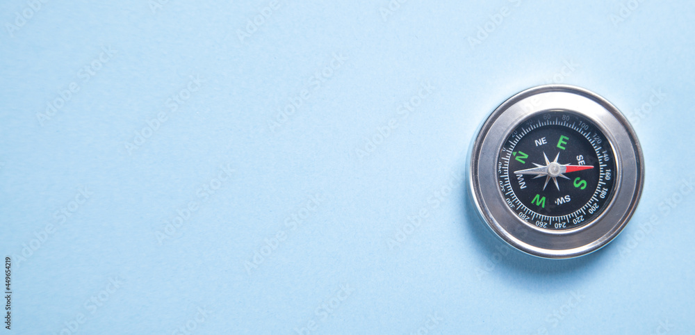 Compass on the blue background. Compass on the blue background.