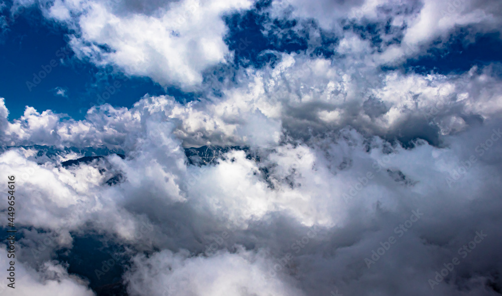 mountain with cloud patches and blue sky at morning from flat angle mountain with cloud patches and blue sky at morning from flat angle
