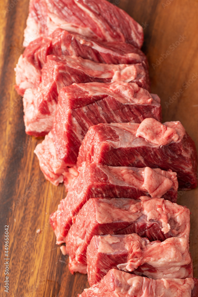 raw meat on a wooden board raw meat on a wooden board