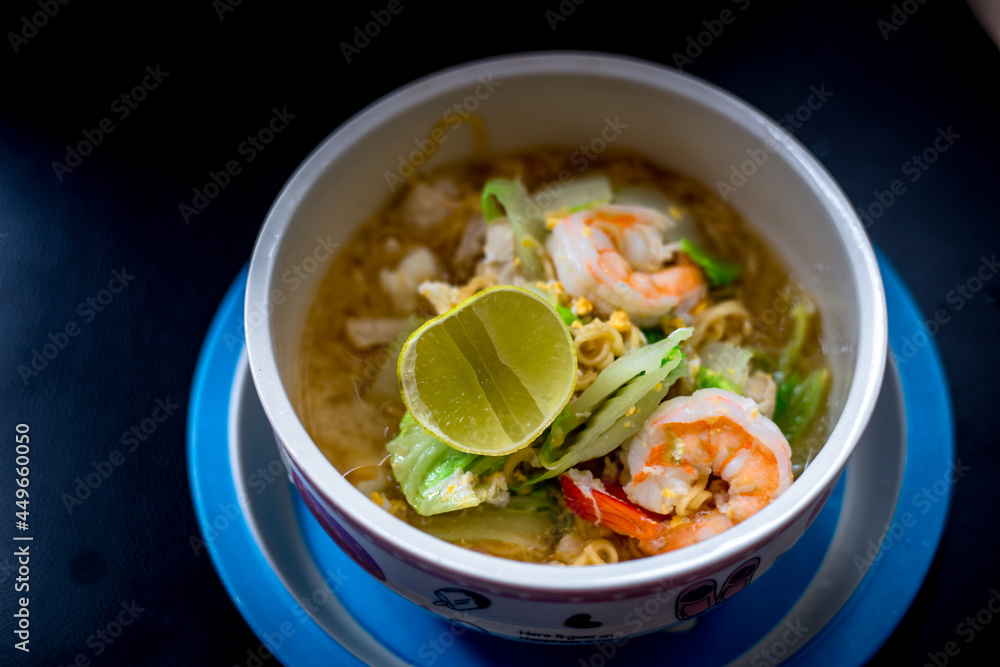 Background of food menu (stir-fried noodles with fresh shrimp), a cup for cooking at home or serving food to customers. Background of food menu (stir-fried noodles with fresh shrimp), a cup for cooking at home or serving food to customers.