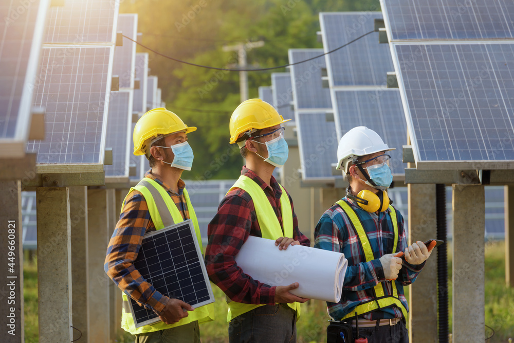 engineer working or checking equipment in solar power plant engineer working or checking equipment in solar power plant