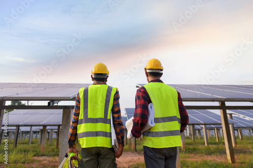 engineer working or checking equipment in solar power plant