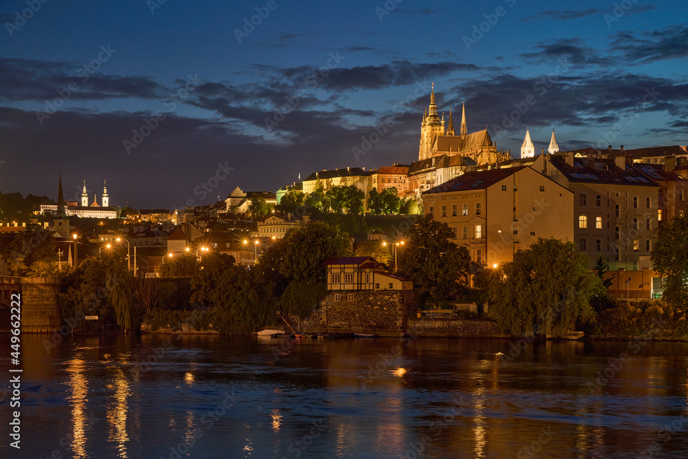 Prague Castle and Vltava river at dusk