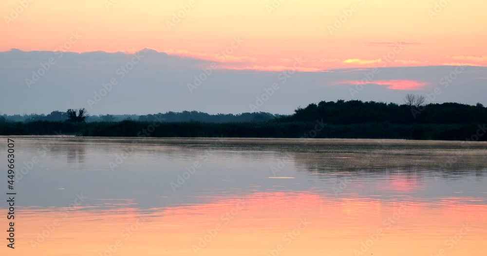 Time lapse golden light sunrise in morning. Big sun with clouds sunset timelapse. Amazing light of nature near river or lake. Landscape Time lapse golden light sunrise in morning. Big sun with clouds sunset timelapse. Amazing light of nature near river or lake. Landscape