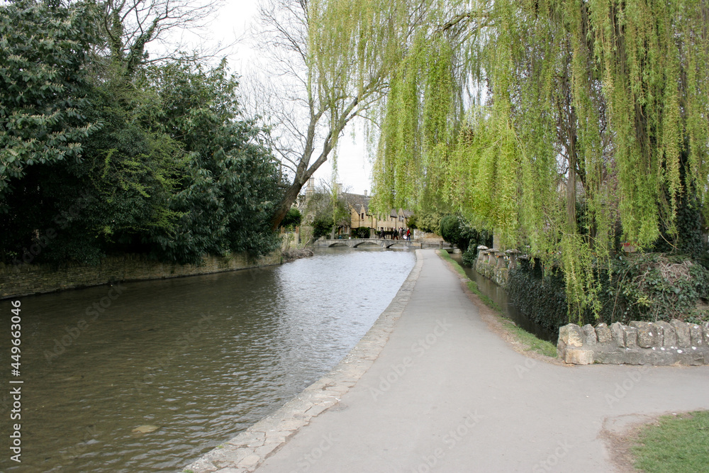 Views of the River Windrush at Bourton on the Water in Gloucestershire in the UK
