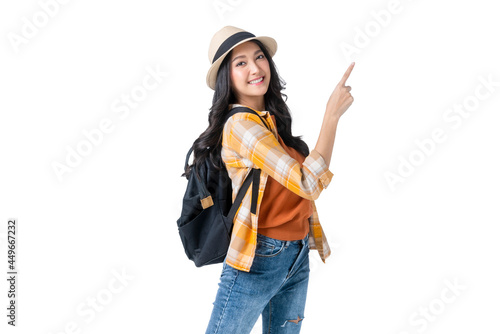 traveller adult attractive cheerful smiling asian female wear casual cloth with hat and purse ready to travel in summer time vacation ideas concept isolate white background photo