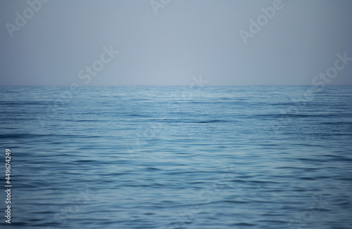 Grey sky and blue sea water © Mira