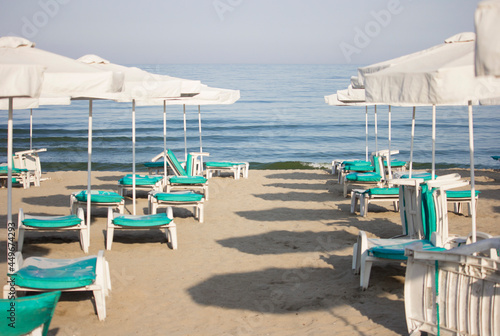 Parasols and lounge chairs at the beach