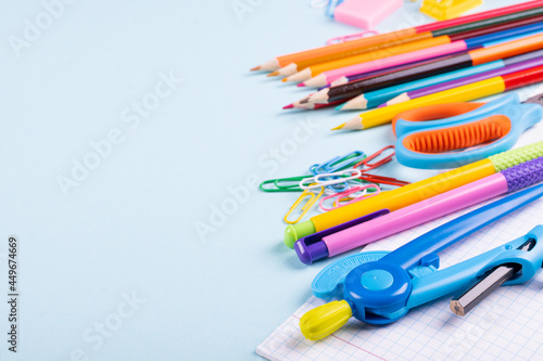 School supplies on a color background, table to view, copy space