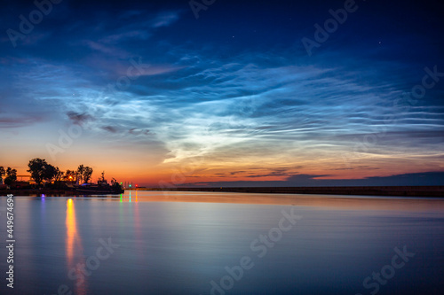 Night scenery in Gdynia with noctilucent clouds over the harbor. Poland © Patryk Kosmider