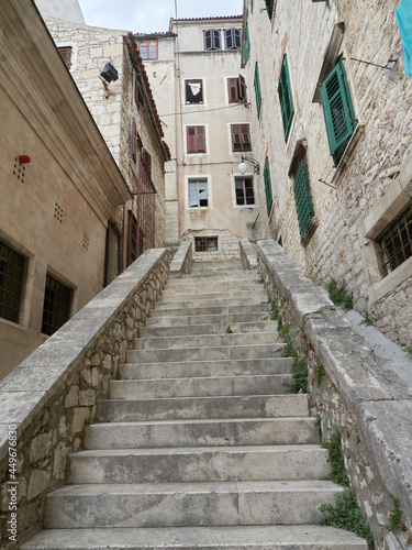 Steep stone stairs and historic tenement houses in the old town of Sibenik © Lukasz