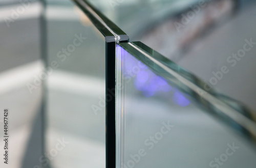 Closeup frameless laminated glass balcony railing.