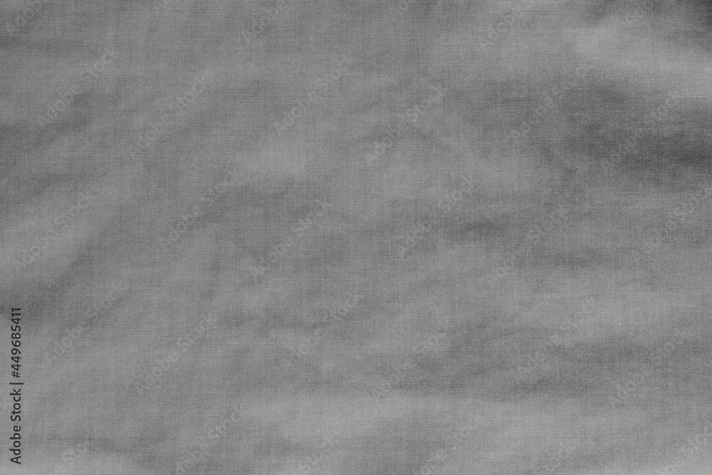 Naklejka premium The texture of uneven natural cotton black fabric, abstract background.