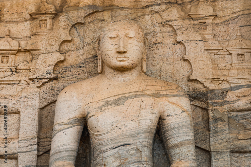 Ancient City of Polonnaruwa. Photo of seated Buddha in meditation at Gal Vihara Rock Temple (Gal Viharaya). Sri Lanka