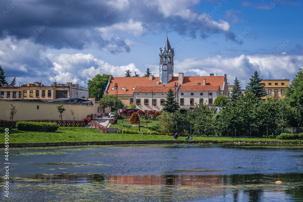 Pond in Barczewo town, view with City Hall building, Poland