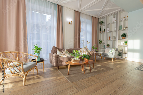 Fototapeta Naklejka Na Ścianę i Meble -  modern expensive luxurious open-plan apartment. Rich Scandinavian-style interior with wooden beams on the ceiling in pastel colors